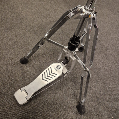 Pre-Owned Yamaha Close-up of a metallic drum pedal on a textured surface