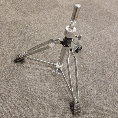 Pre-Owned Donner Drum stand on a gray textured surface