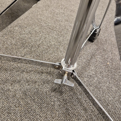 Pre-Owned Donner Close-up of a metal chair leg on a carpeted floor