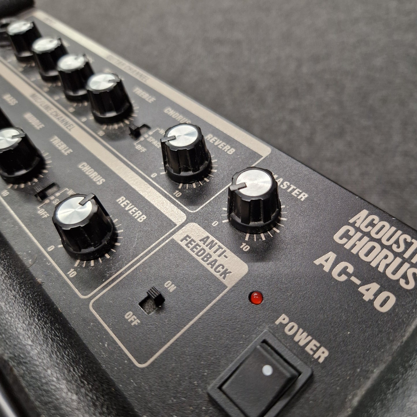 Pre-Owned Roland Close-up of an Acoustic Chorus AC-40 guitar effects pedal with control knobs and power switch.