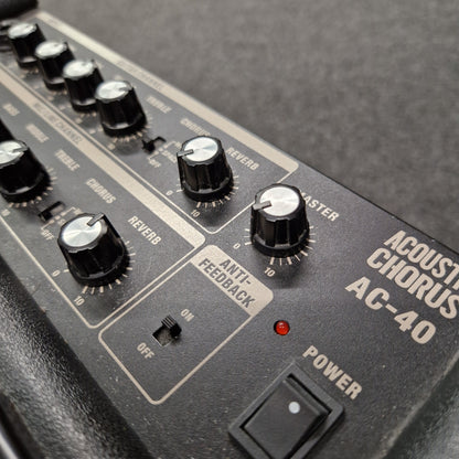 Pre-Owned Roland Close-up of an Acoustic Chorus AC-40 guitar effects pedal with control knobs and power switch.