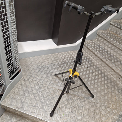 Pre-Owned Hercules Mechanical arm or crane in a workshop setting with a textured wall background