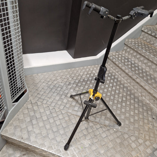 Pre-Owned Hercules Mechanical arm or crane in a workshop setting with a textured wall background