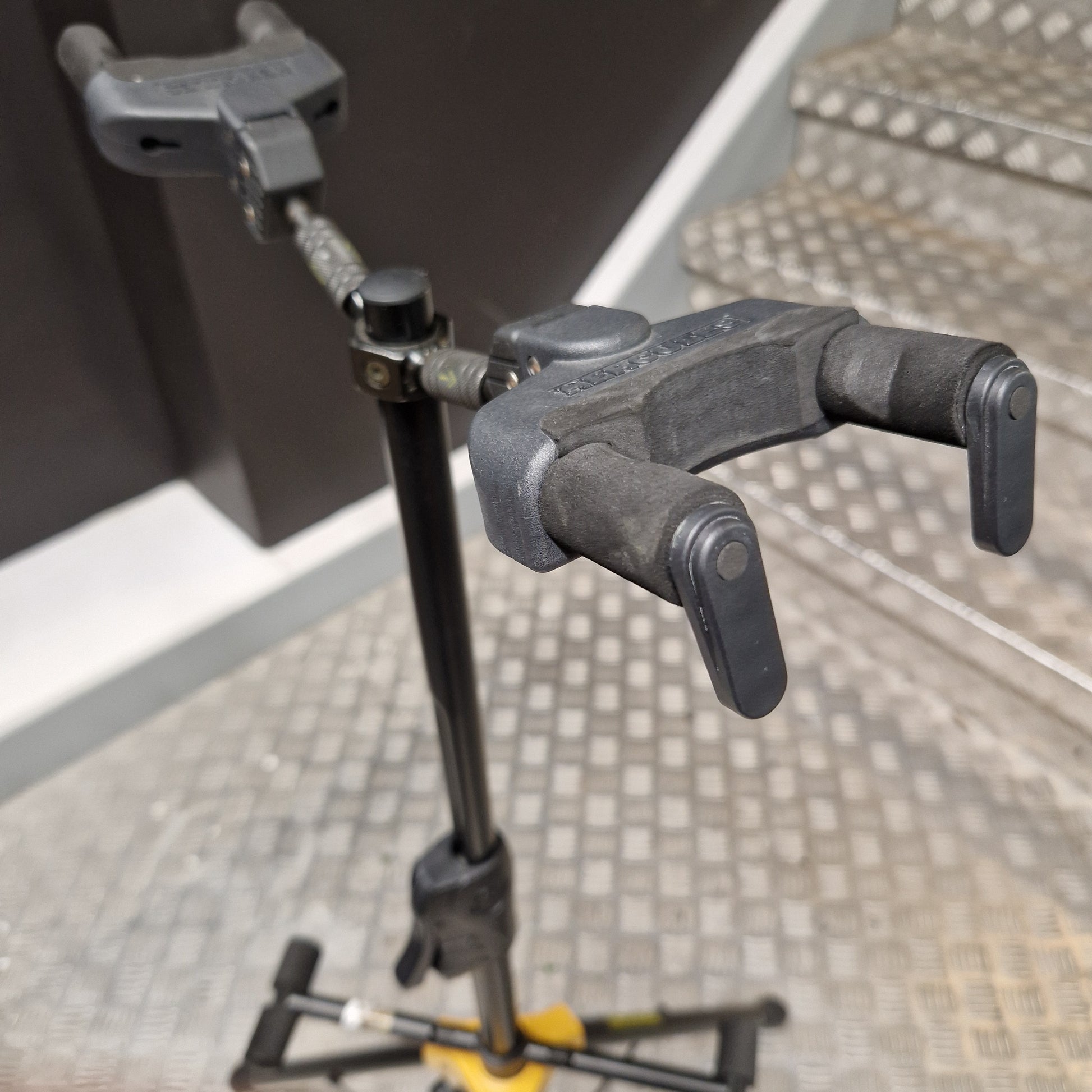 Pre-Owned Hercules Close-up of a clamp on a metal surface with a blurred background