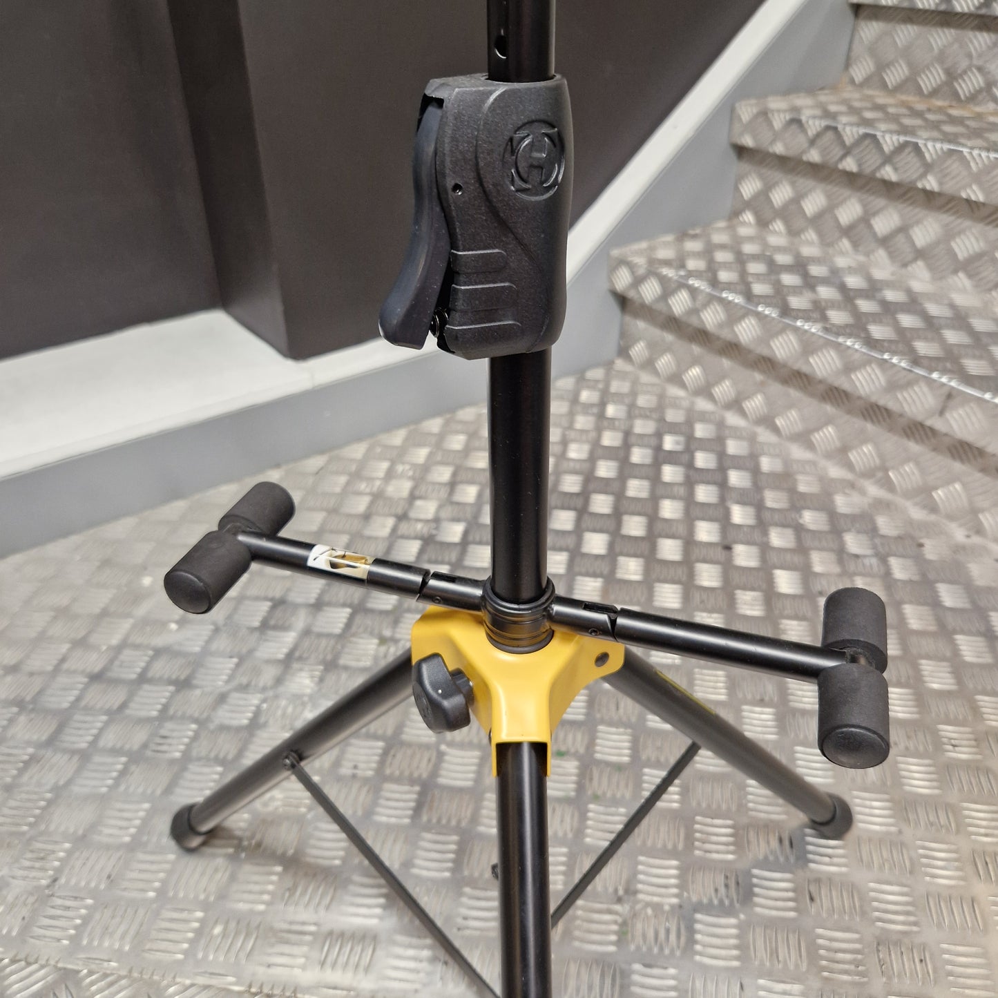 Pre-Owned Hercules Close-up of a black and yellow tool on a textured metal surface