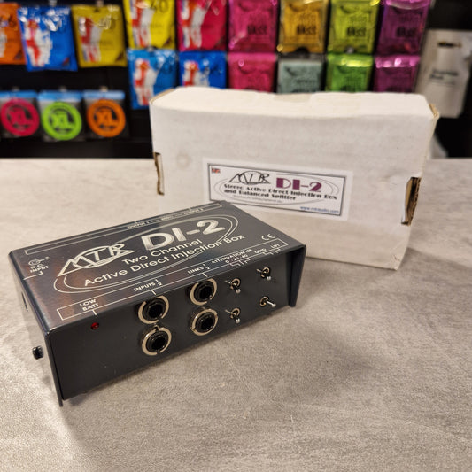 Pre-Owned MTR Audio DI-2 box with a white box labeled 'AFL' in a store setting.