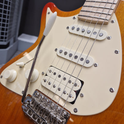 Pre-Owned Lag Close-up of a guitar's neck and headstock with a focus on the tuning pegs and strings.