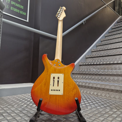 Pre-Owned Lag Electric guitar on a stand with acoustic panels in the background