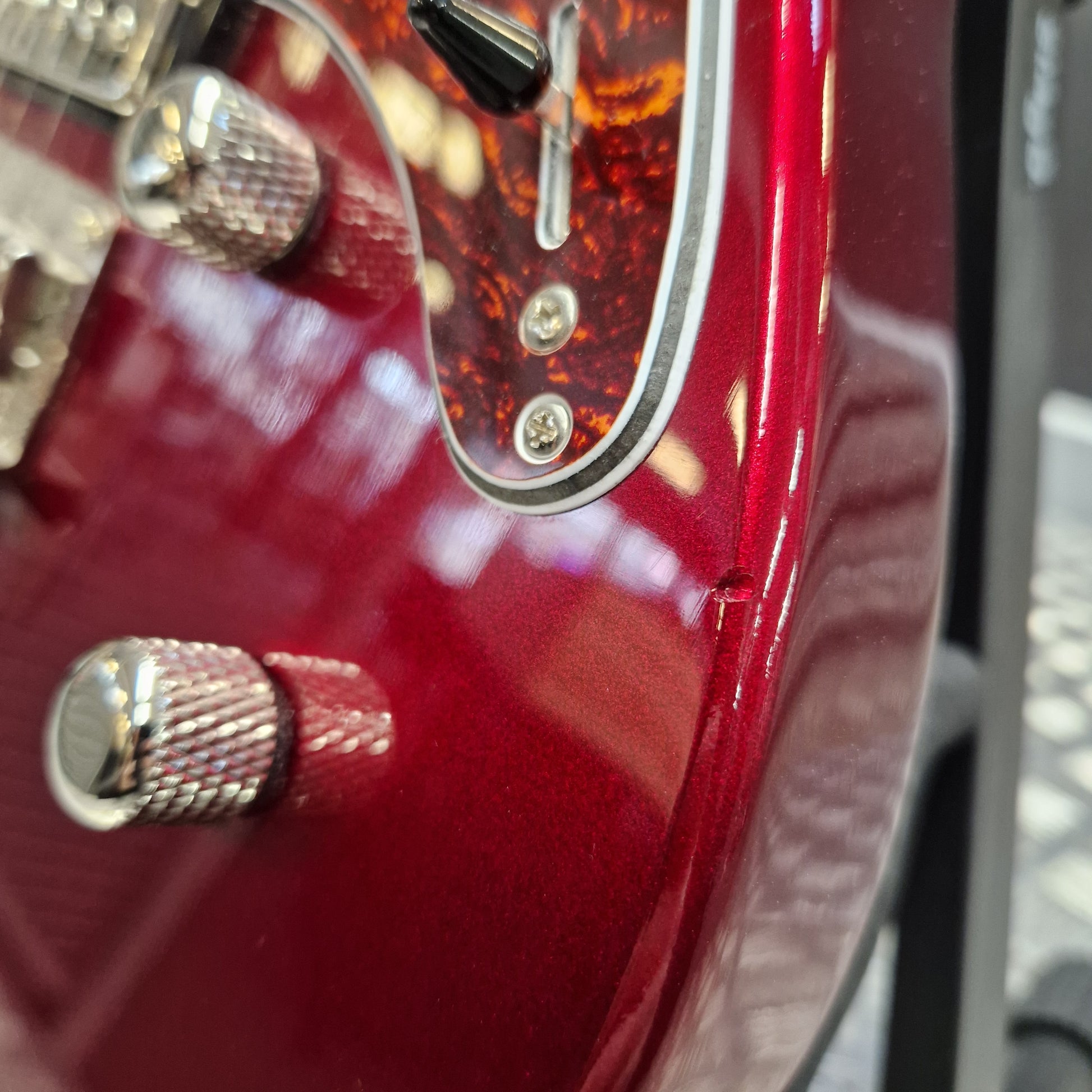 Pre-Owned Yamaha Close-up of a red electric guitar with visible brand name.