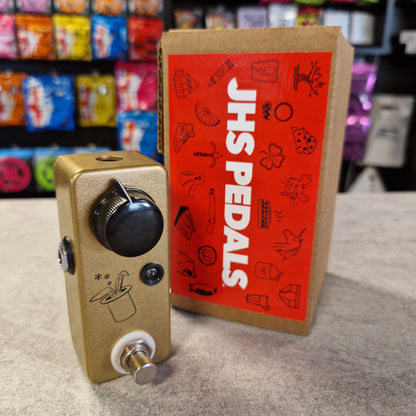 Pre-Owned JHS Guitar effects pedal with JHS Pedals packaging in a store setting
