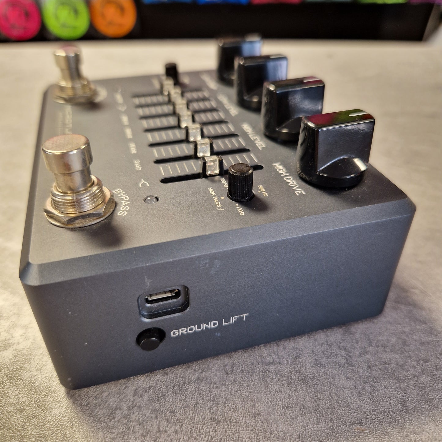 Pre-Owned Darkglass Audio effects pedal with knobs and buttons on a gray surface