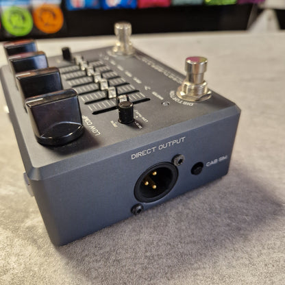 Pre-Owned Darkglass Audio effects pedal with knobs and connectors on a gray surface