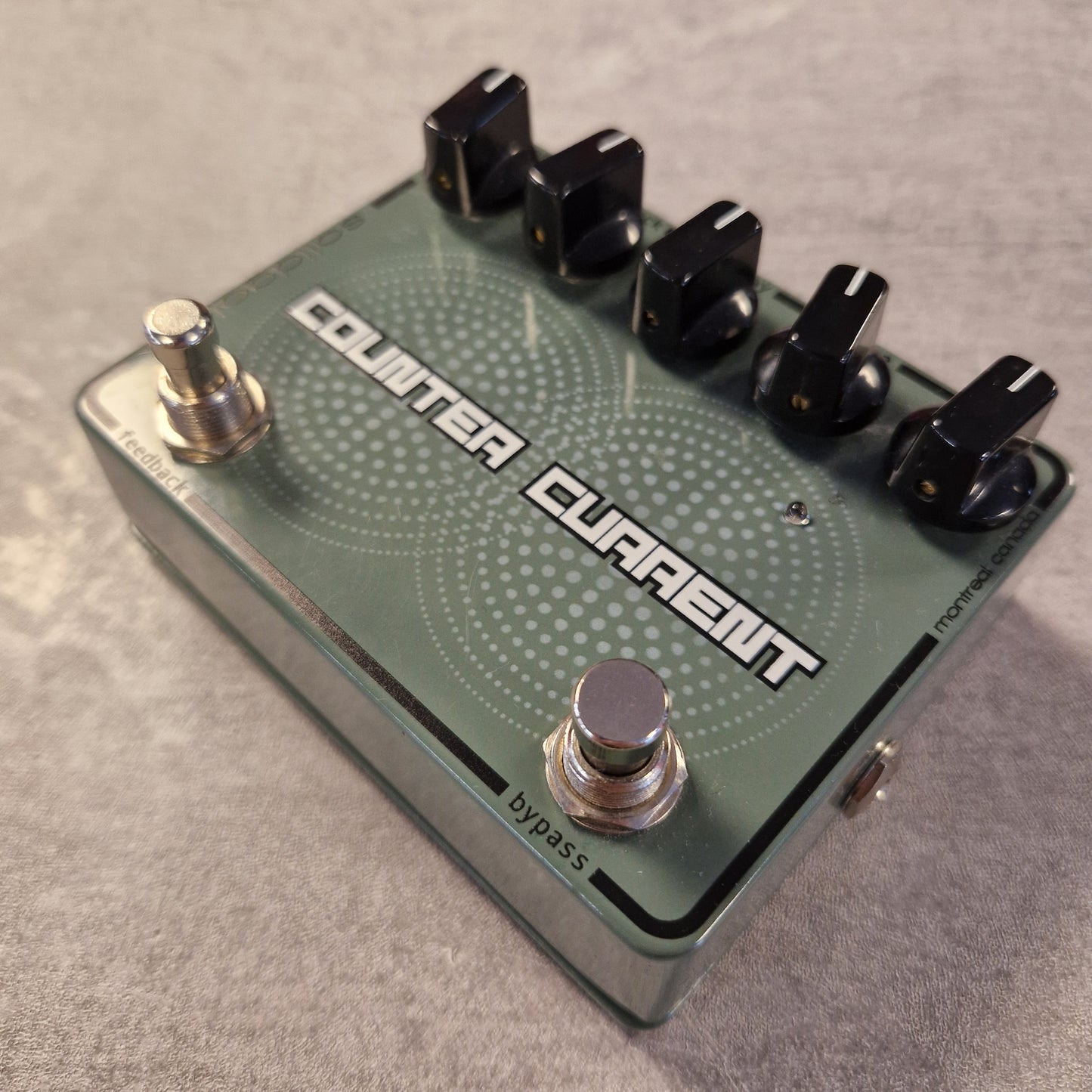Pre-Owned SolidGoldFx Guitar effects pedal with 'Counter Current' branding on a gray surface