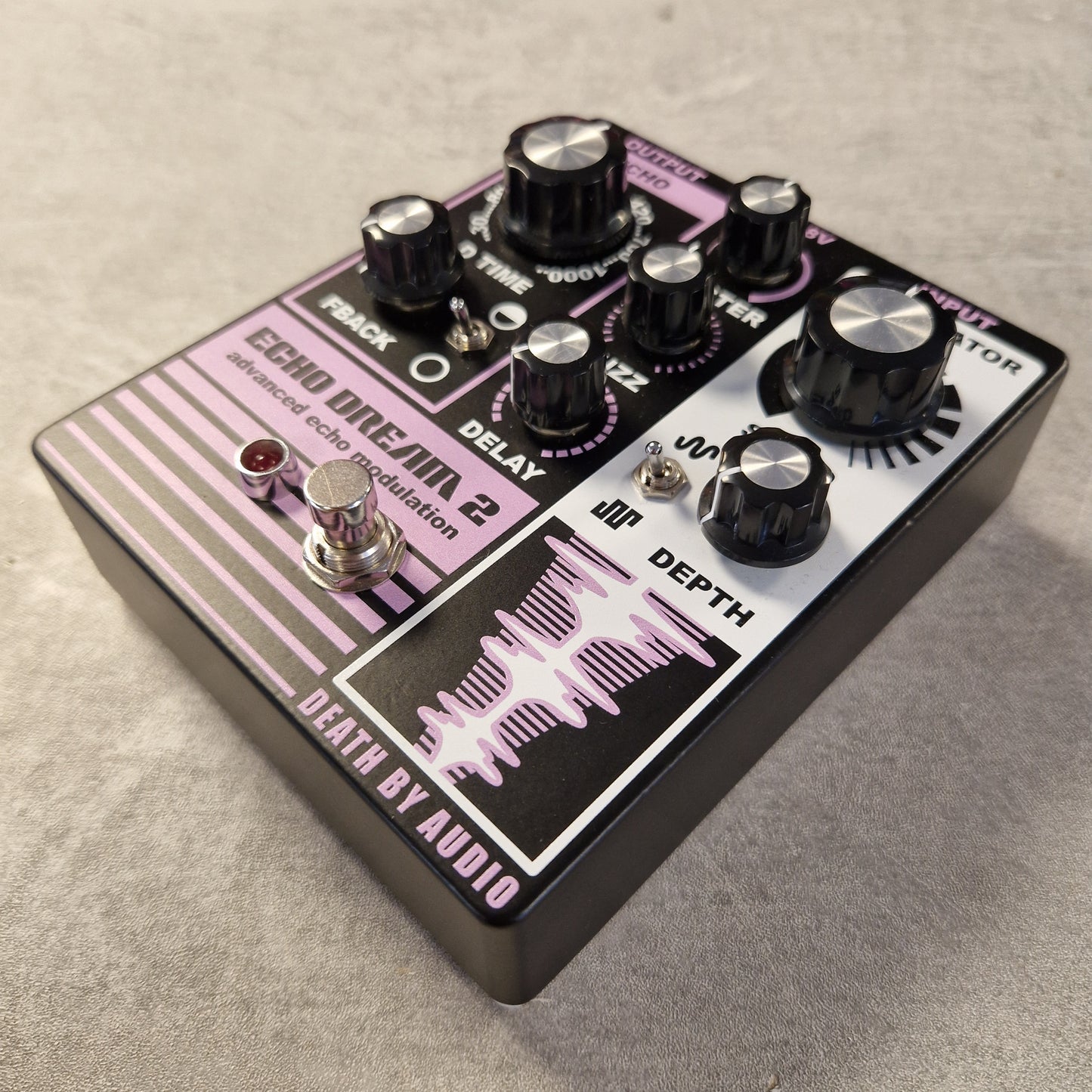 Pre-Owned Death By Audio Guitar effects pedal with 'Death by Audio' branding on a textured surface