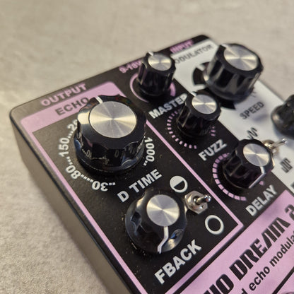 Pre-Owned Death By Audio Guitar effects pedal with control knobs on a beige surface