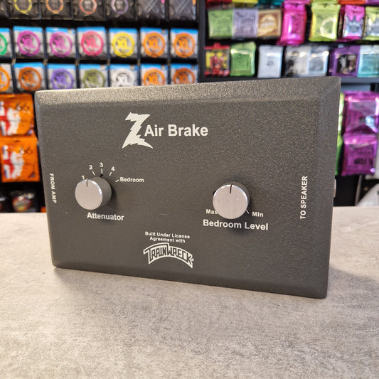Pre-Owned Dr. Z Trainwreck Audio equalizer panel with knobs and branding on a gray background