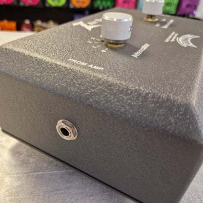 Pre-Owned Dr. Z Trainwreck Close-up of a guitar amplifier with control knobs and speaker cone.