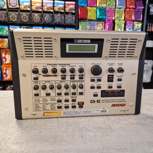 Pre-Owned Boss GS-10 Guitar effects pedal with multiple controls and display on a gray surface
