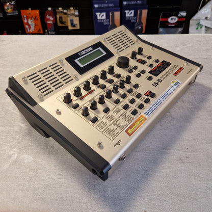 Pre-Owned Boss GS-10 Vintage-style electronic device with control knobs and display on a gray surface
