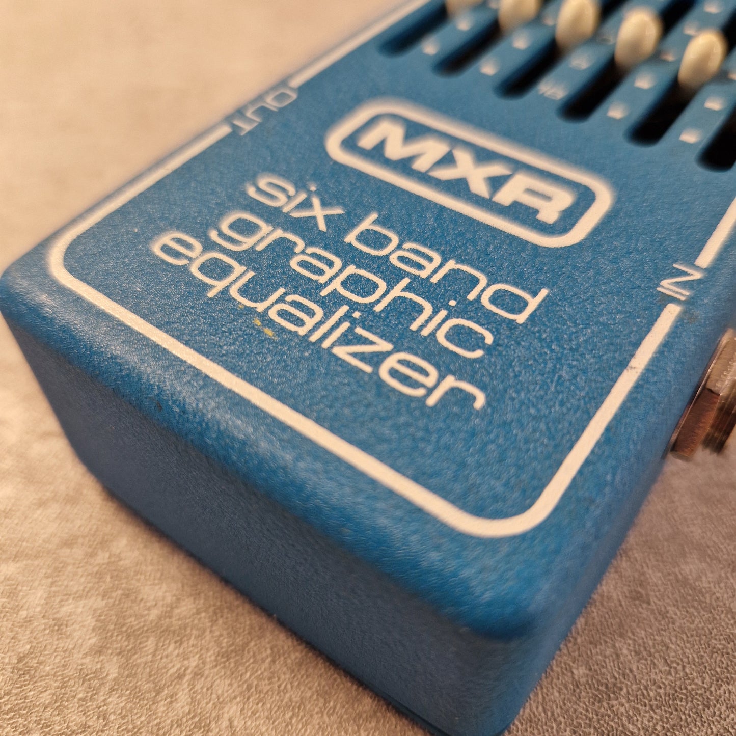 Pre-Owned MXR MX-109 Blue MXR six band graphic equalizer pedal on a beige surface