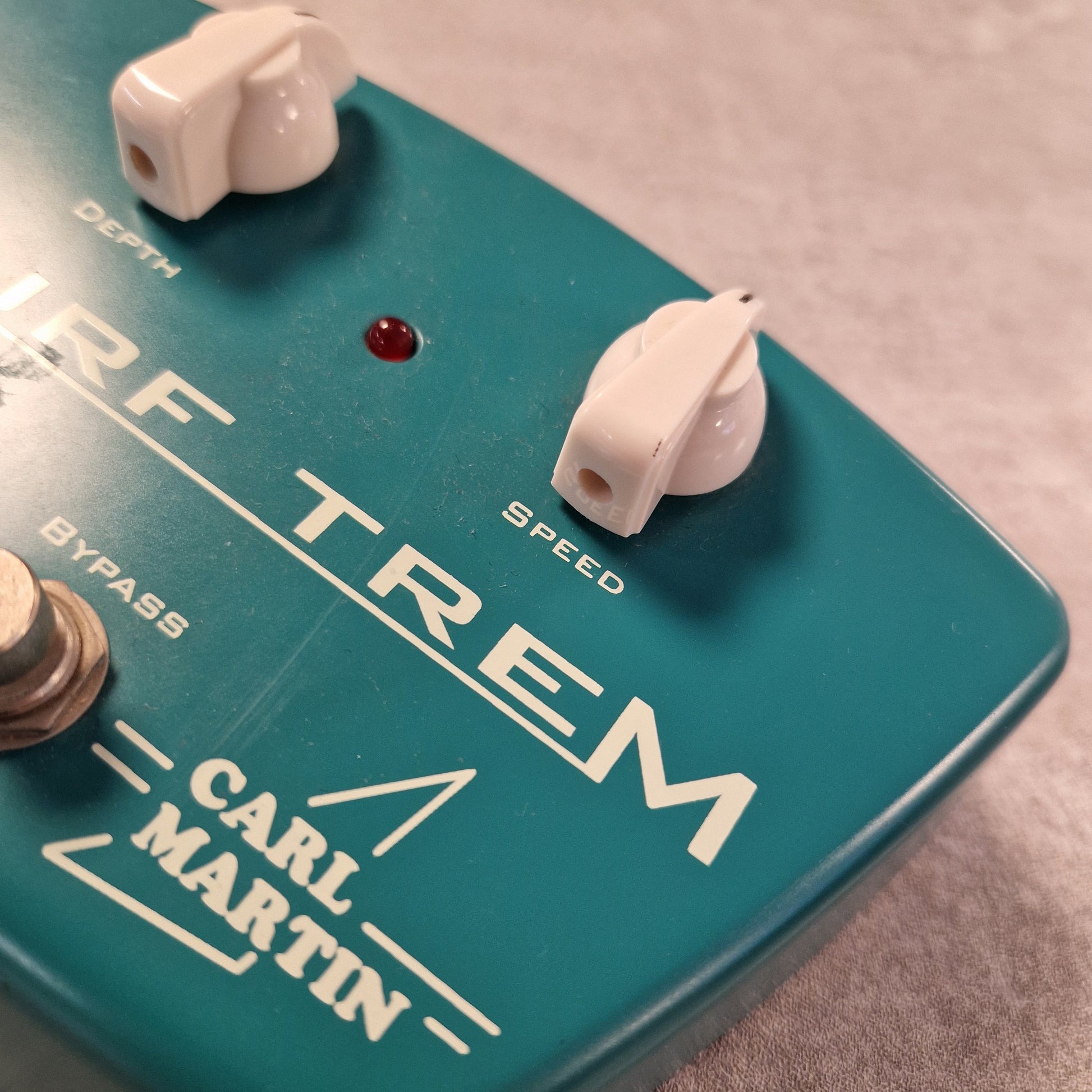 Pre-Owned Carl Martin Surf Trem Close-up of a Carl Martin RF Trem tremolo pedal with visible branding.