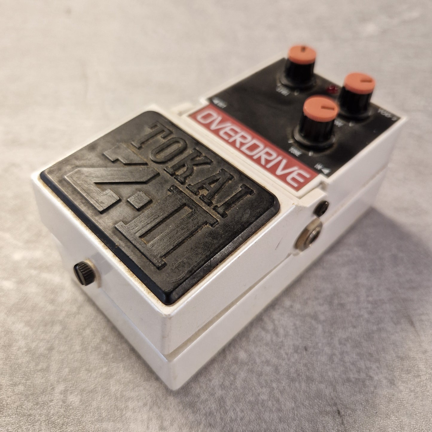 Pre-Owned Tokai Z-II TOD-2 Hodaka Overdrive guitar effects pedal on a gray surface