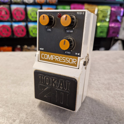 Pre-Owned Tokai Z-II TCO-2 Compressor guitar pedal with visible brand name on a textured surface