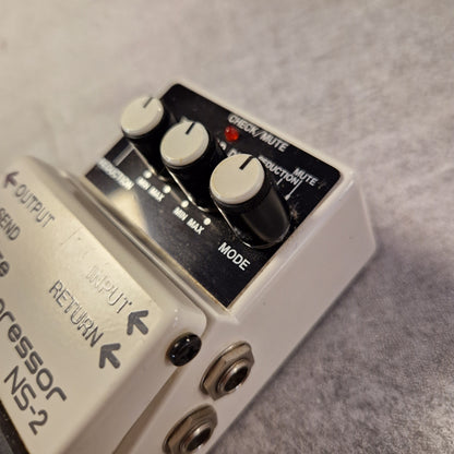 Pre-Owned Boss NS-2 Guitar effects pedal with control knobs and labels on a gray background