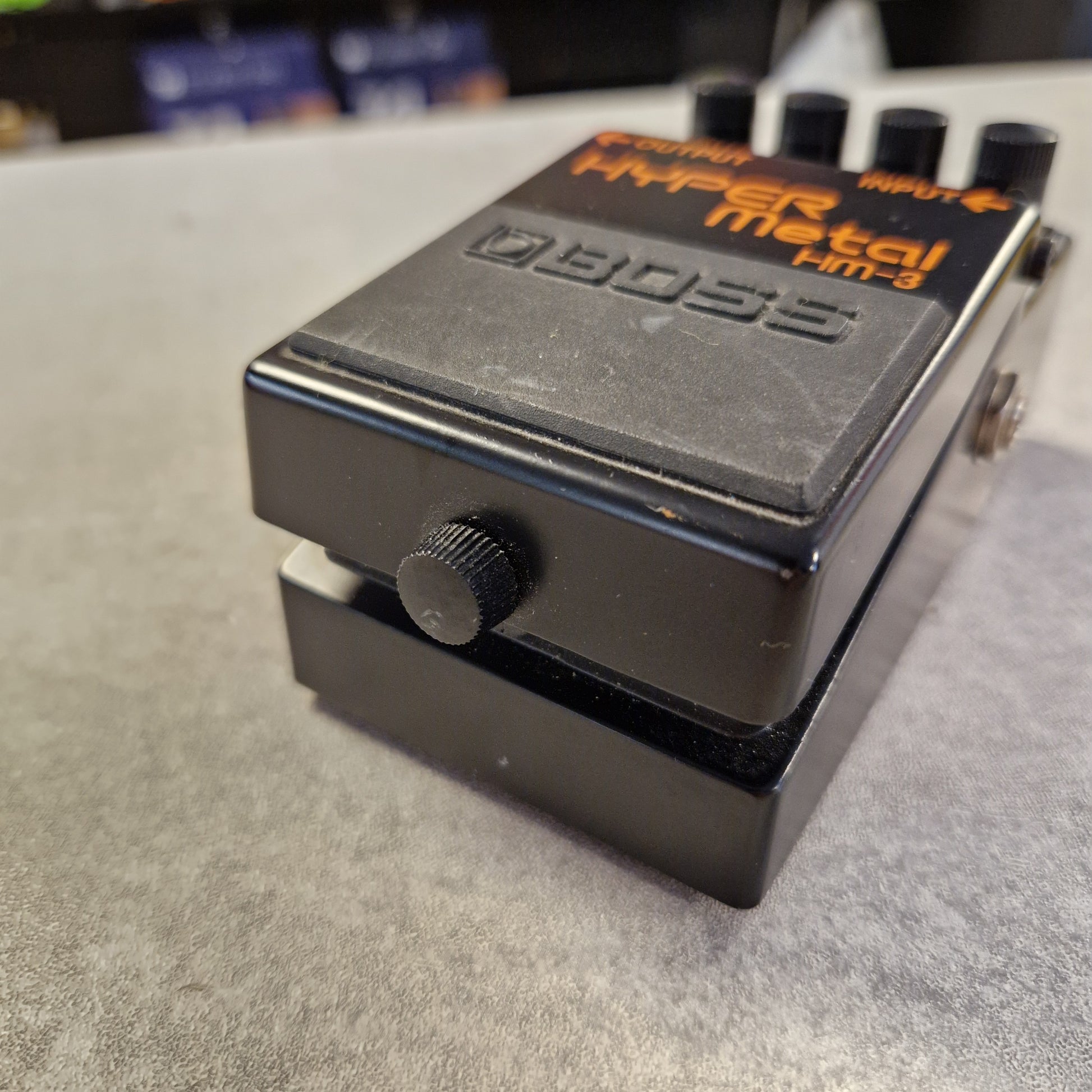 Pre-Owned Boss HM-3 Boss guitar effects pedal on a textured surface