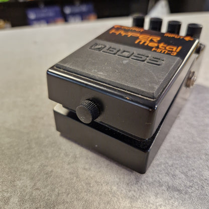 Pre-Owned Boss HM-3 Boss guitar effects pedal on a textured surface