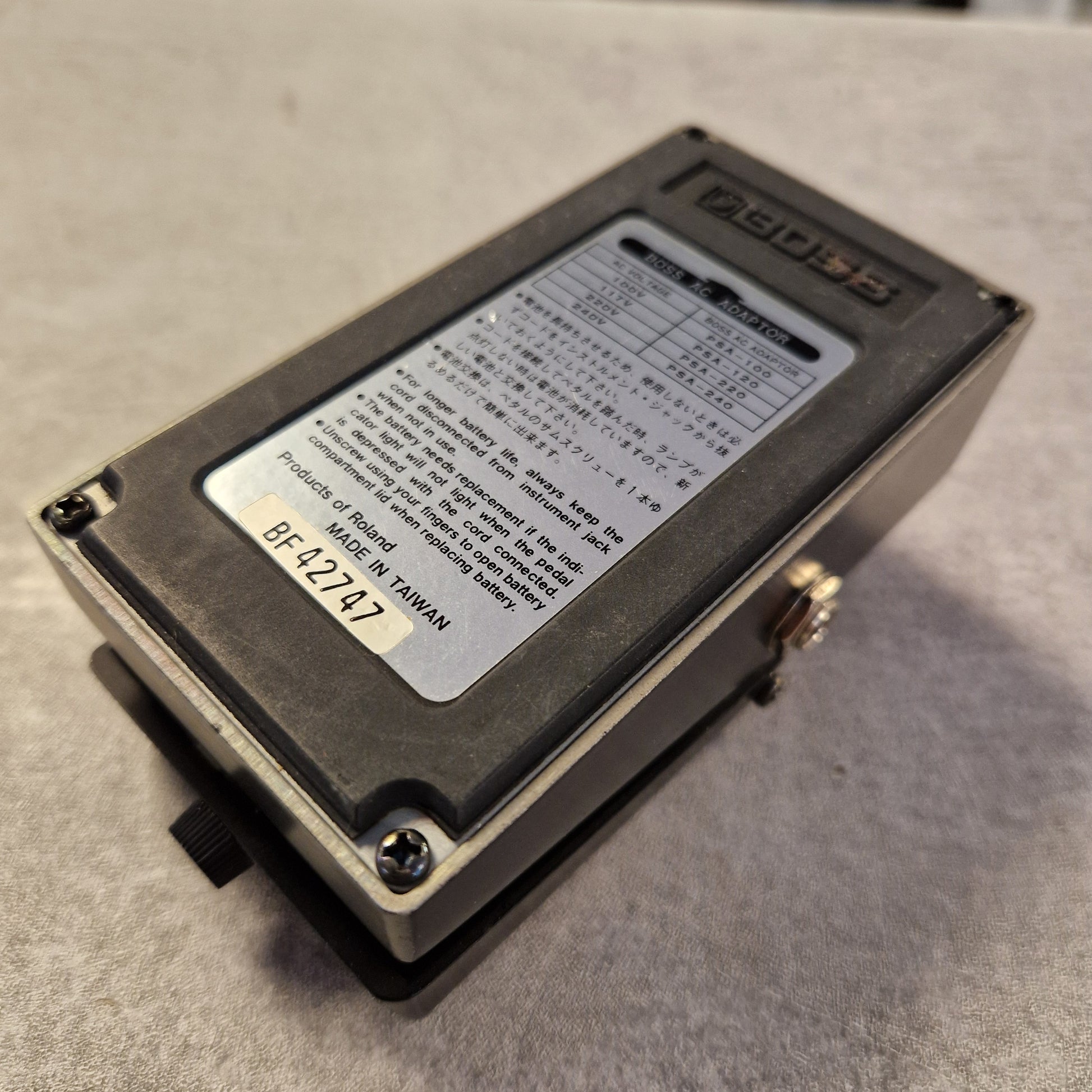 Pre-Owned Boss HM-3 Small electronic device with text and a model number on a gray surface