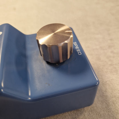 Pre-Owned Ibanez PT-999 Blue control knob with a metallic top labeled 'Speed' on a beige background