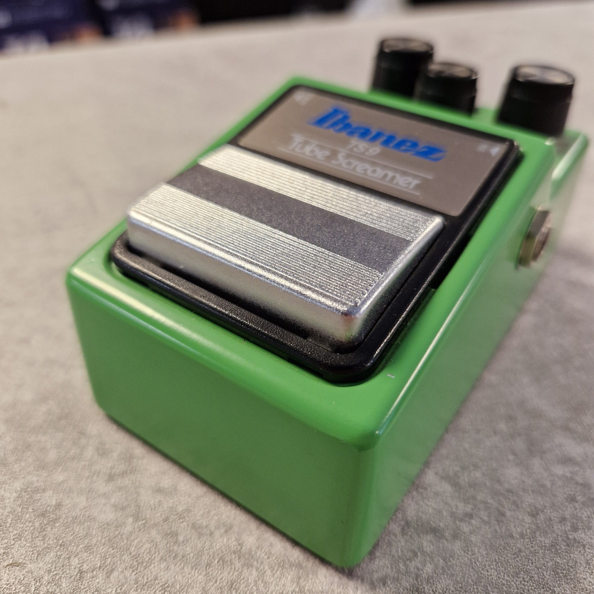 Pre-Owned Ibanez TS9 Green guitar effects pedal with 'DigiTech' branding on a gray surface
