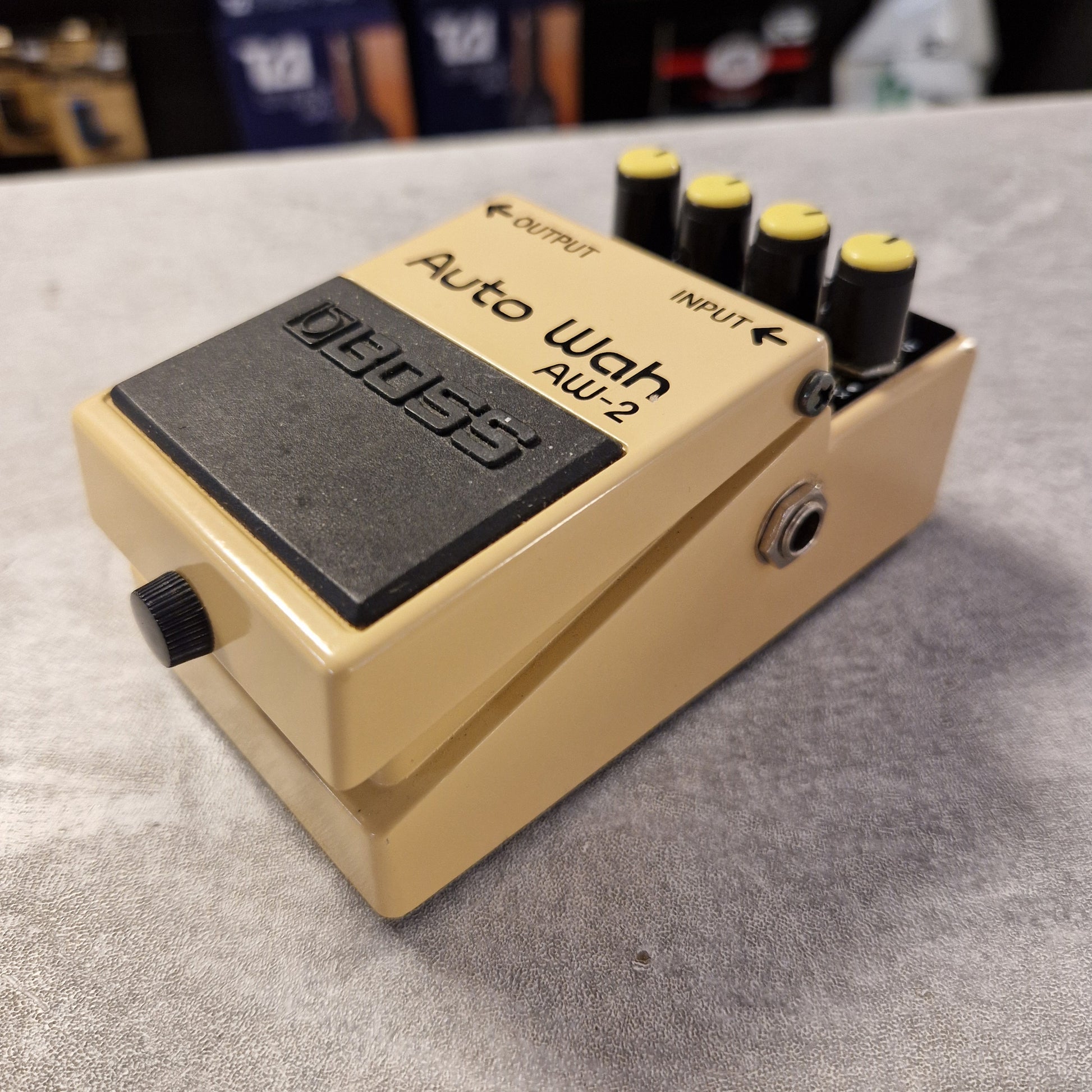 Pre-Owned Boss AW-2 Boss Auto Wah AU-2 pedal on a gray surface