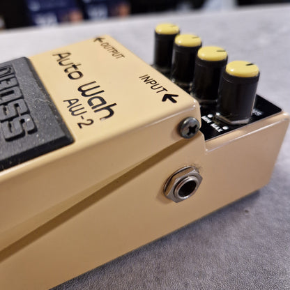Pre-Owned Boss AW-2 Denon Auto Wah AU-2 guitar effects pedal on a gray surface