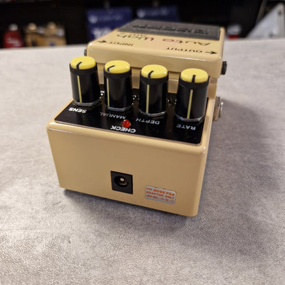 Pre-Owned Boss AW-2 Beige guitar effects pedal with knobs on a gray surface
