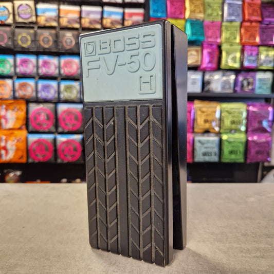 Pre-Owned Boss FV-50H Black rectangular object with 'BOSS FV50' branding against a colorful background