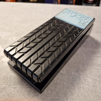 Pre-Owned Boss FV-50H Metallic grill on a textured surface with a visible brand label.