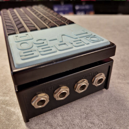 Pre-Owned Boss FV-50H Black metal block with threaded holes on a textured surface