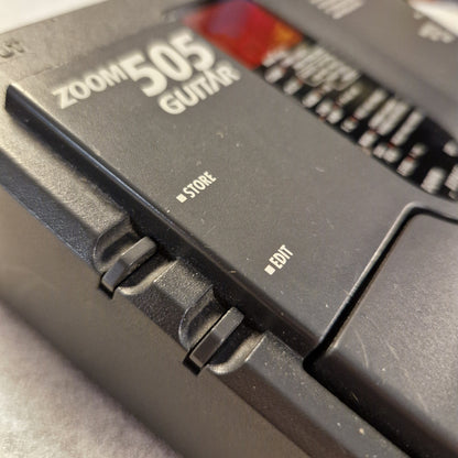 Pre-Owned Zoom 505 Close-up of a credit card with 'Zoonio 2025' branding on a gray background