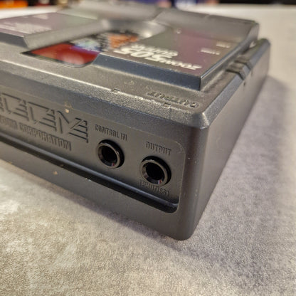 Pre-Owned Zoom 505 Close-up of a cassette tape on a textured surface