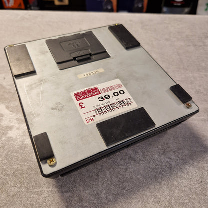 Pre-Owned Zoom 505 Metal box with a label on a gray surface
