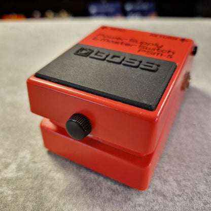 Pre-Owned Boss PSM-5 Red and black guitar effects pedal on a textured surface