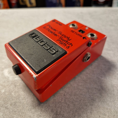Pre-Owned Boss PSM-5 Red Boss guitar pedal on a gray surface