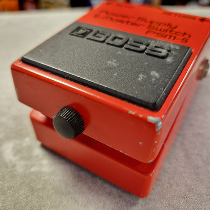 Pre-Owned Boss PSM-5 Red electronic device with 'BOSS' branding on a textured surface