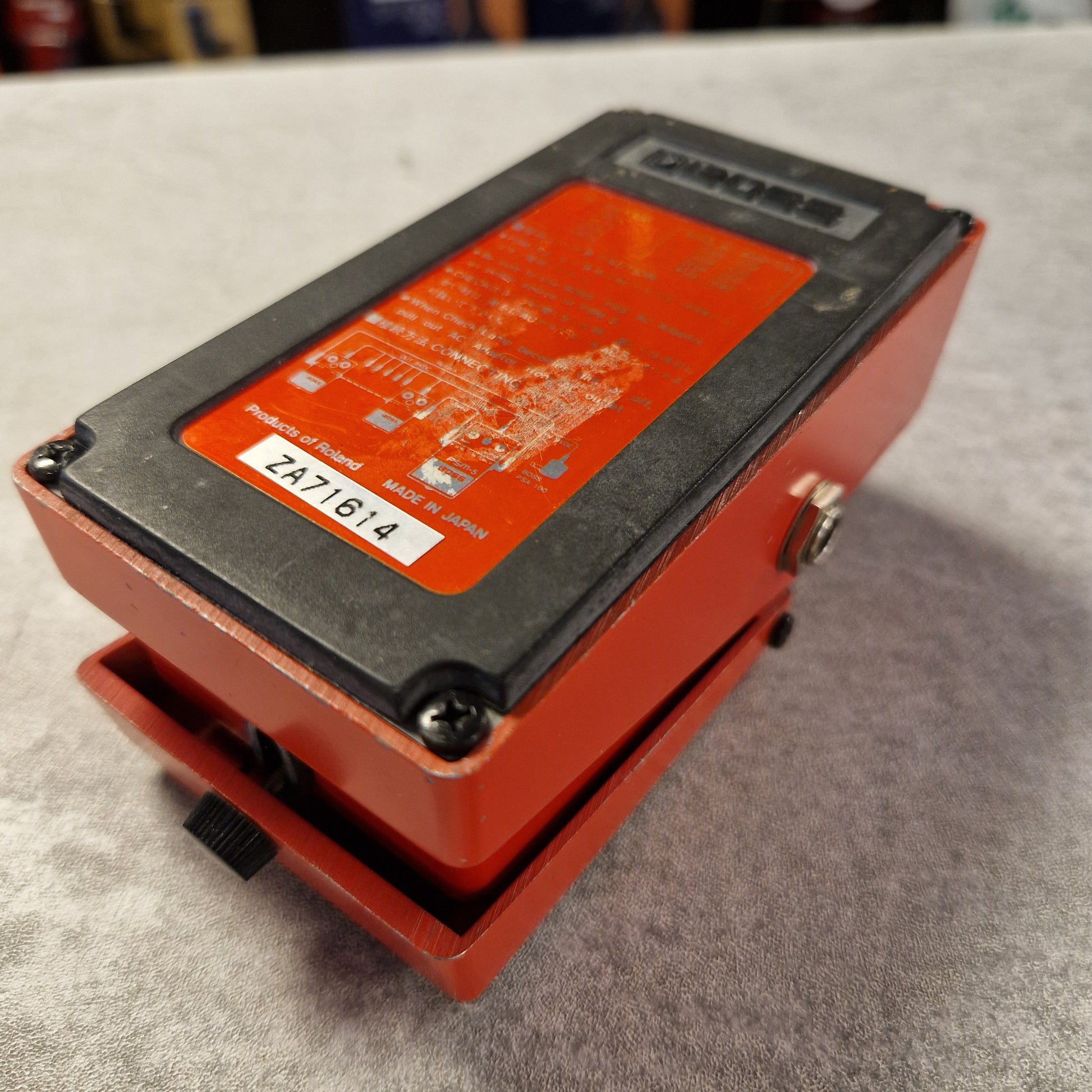 Pre-Owned Boss PSM-5 Red electronic device with a circuit board on a gray surface