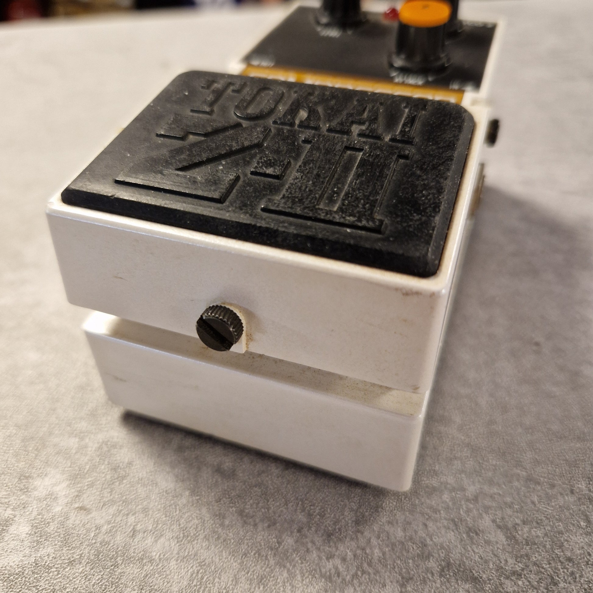 Pre-Owned Tokai Z-II TCO-2 Metal and black component on a gray background