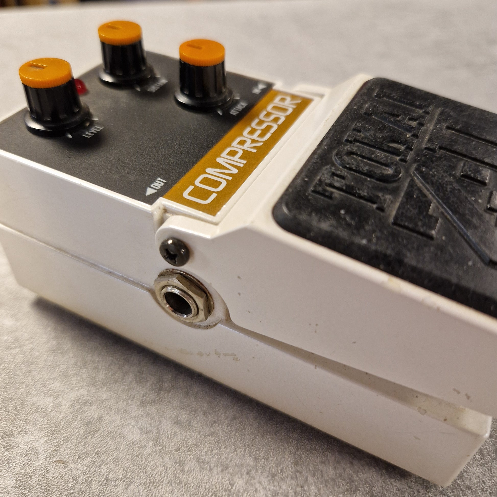 Pre-Owned Tokai Z-II TCO-2 Close-up of a guitar effects pedal with 'Dunlop' branding on a gray surface.