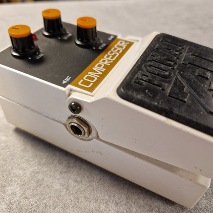 Pre-Owned Tokai Z-II TCO-2 Close-up of a guitar effects pedal with 'Dunlop' branding on a gray surface.