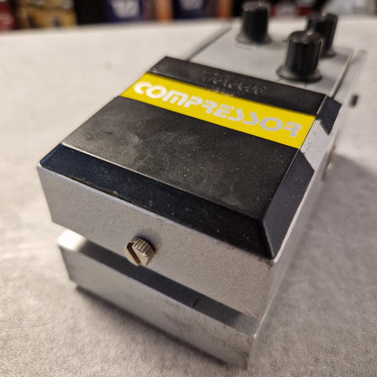 Pre-Owned Tokai TCO-1 Metal foot pedal with 'Compressor' label on a gray surface